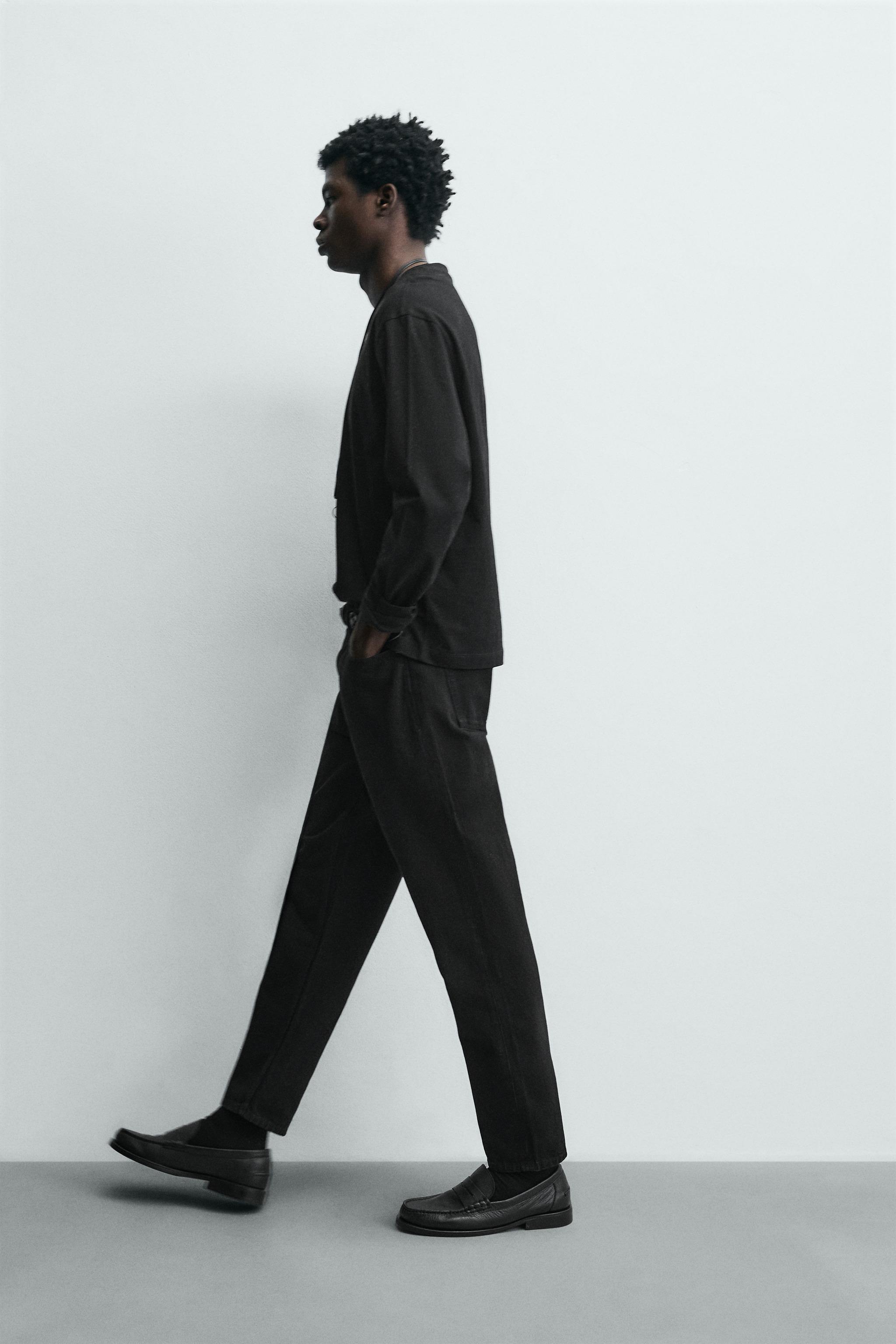 SLIM TAPERED FIT JEANS